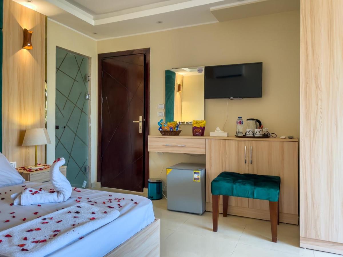 Jumeirah Pyramids View Inn Kafret el-Gabal Esterno foto