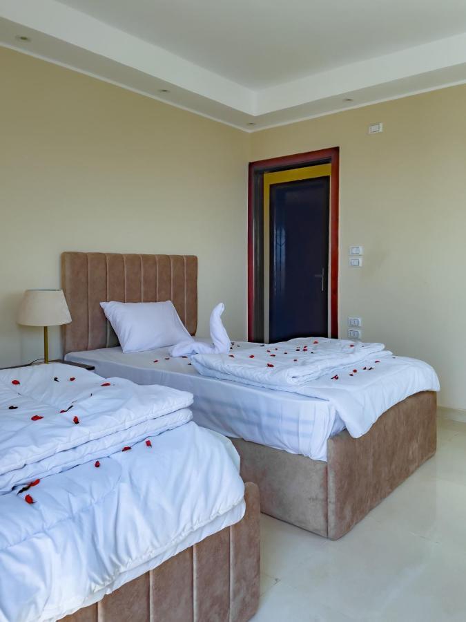Jumeirah Pyramids View Inn Kafret el-Gabal Esterno foto